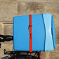 FIXPLUS spanband bevestigd op fiets bagagedrager met bagage
