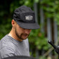 Muc-Off Five Panel Cap zwart - in gebruik op een hoofd