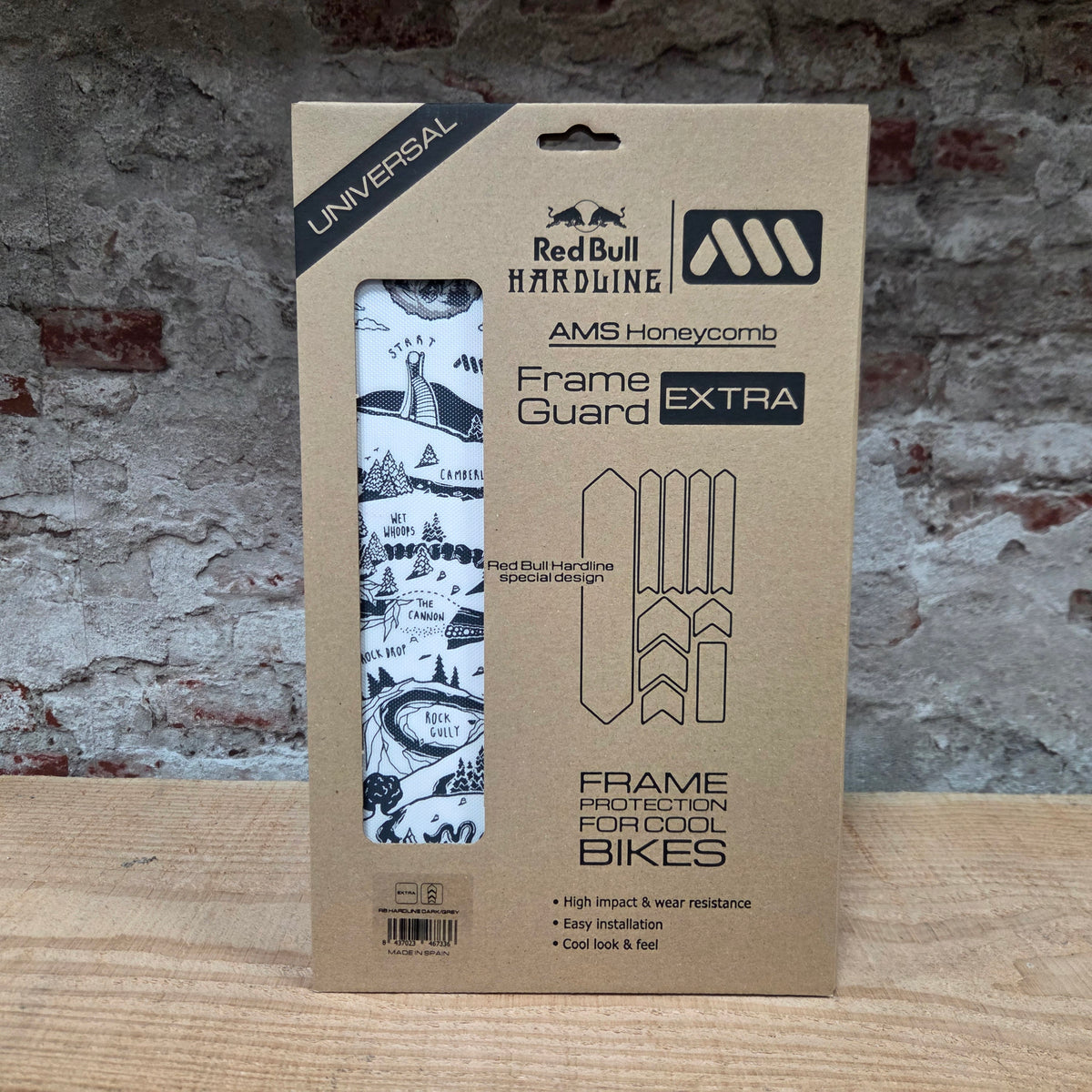 AMS x Red Bull Hardline Frame Guard Extra in de verpakking
