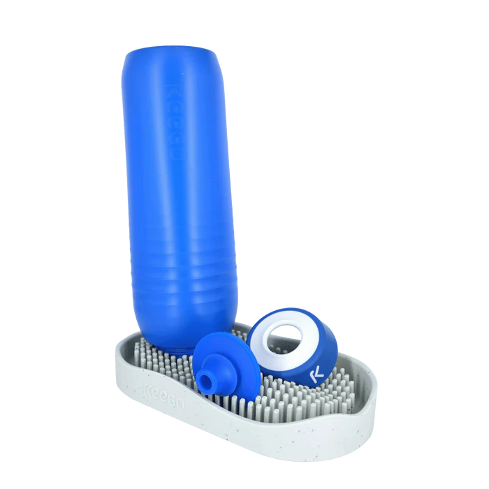 KEEGO Wave Dryer met fles en dop geplaatst
