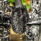 Muc-Off Two Prong Brush tussen de kleinste gaatjes