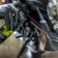 Muc-Off Dry Chain Lube  – met de spraykop op de motorketting
