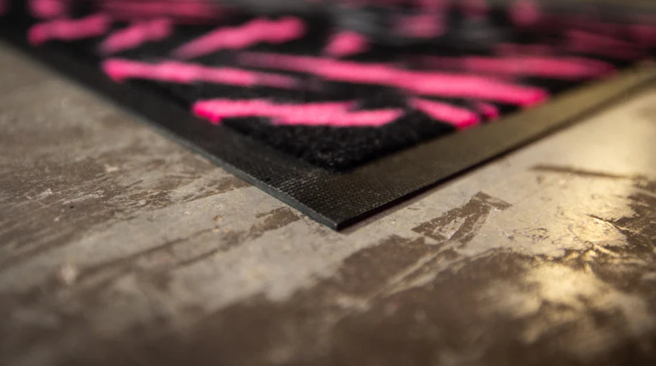 Muc-Off Absorberende Inloopmat - hier de rubberen rand te zien