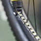 RYDER INNOVATION - luberetta doseren op de schakels van de ketting
