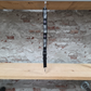Muc-Off lanyard zwart met wit logo en metalen clip in de winkel