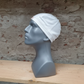 GrandPitstop COOLFIT Skull Cap wit – zijaanzicht op mannequin